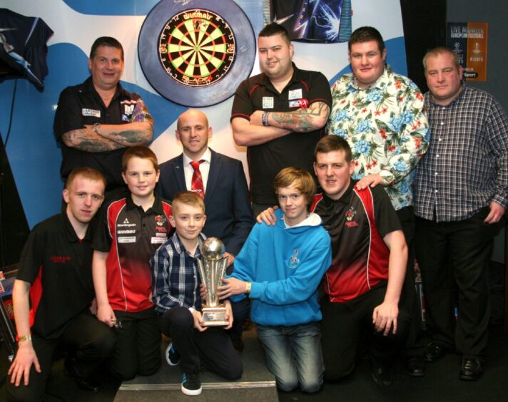 Angus Darts Academy members with Gary Anderson and Michael Smith.