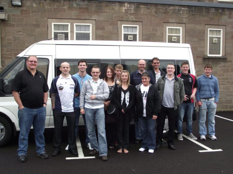 The Arbroath players who travelled to Forfar pictured beside the minibus