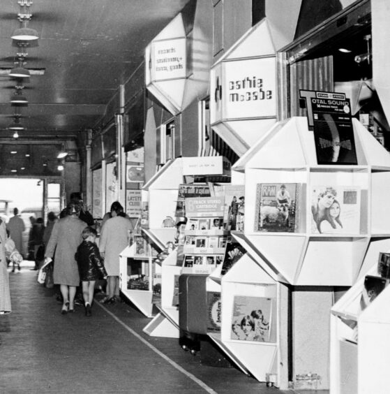 People walk past the entrance to Cathie McCabe's at the City Arcade in 1971. 