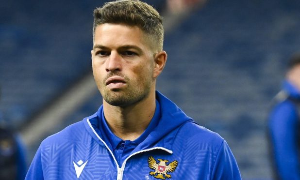 St Johnstone defender, David Keltjens, on the pitch at Ibrox before Saints played Rangers.