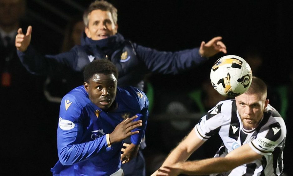 Simo Valakari watches Benji Kimpioka in action against St Mirren.