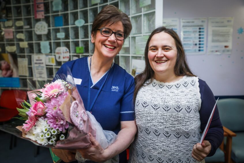 Retired Dundee nurse Alison with Alana at Ninewells Hospital.