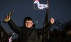 Lochlan Aitken, 10, with his trophy for winning the competition and his goose Christmas light. Image: Mhairi Edwards/DC Thomson