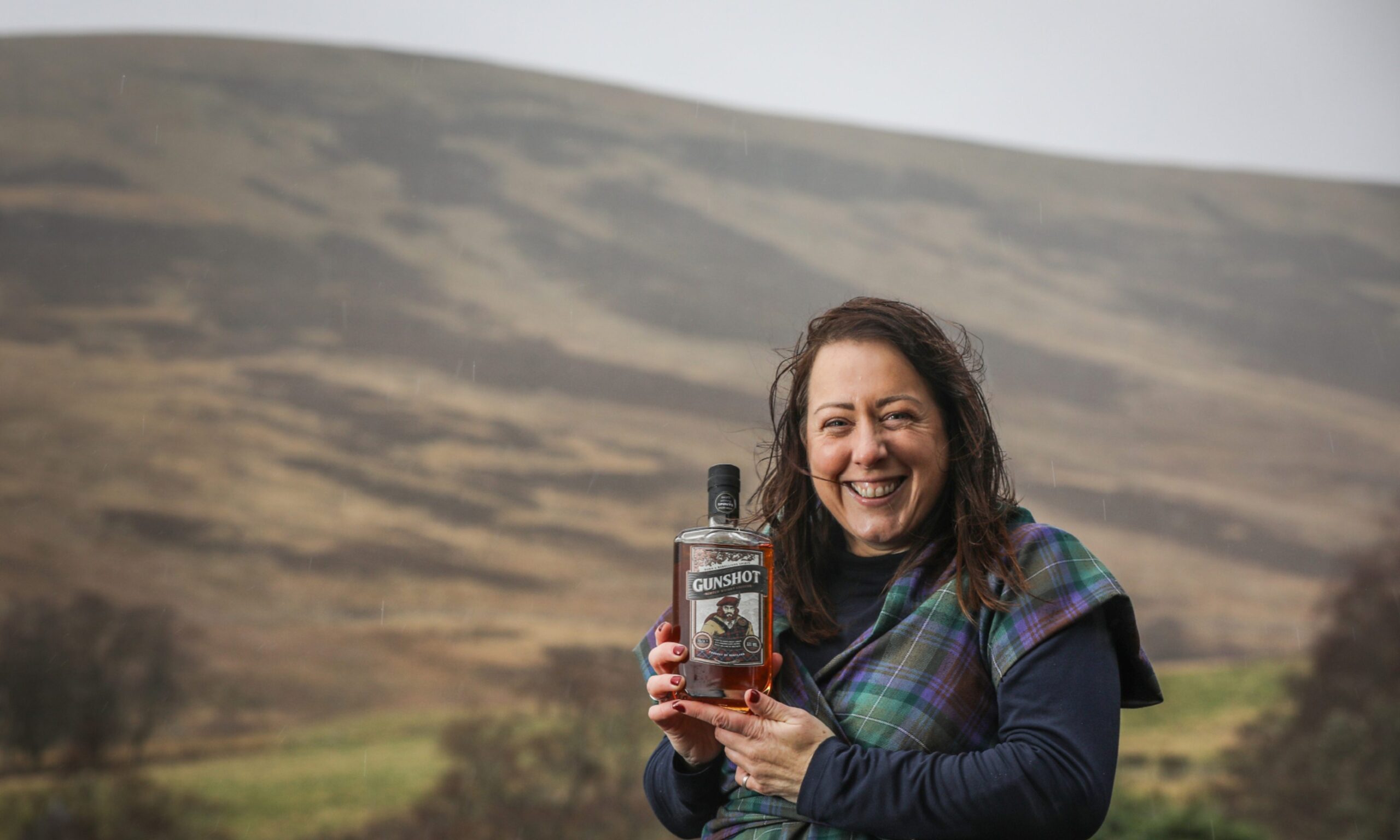 Gin Bothy owner Kim Cameron with her new whisky made in her new Glen Prosen distillery. Image: Mhairi Edwards/DC Thomson