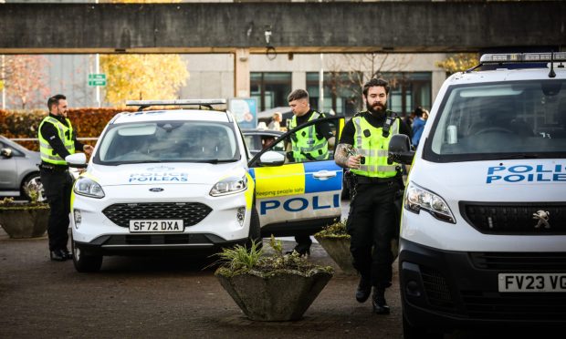 Police at Ninewells Hospital. Image: Mhairi Edwards/DC Thomson