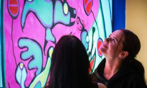 People looking at colourful display in Perth Museum