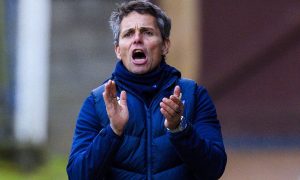 St Johnstone boss Simo Valakari claps on the sideline.