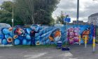 David Crossley spent a total of 38 hours creating a unique mural in Causewayhead, with input from locals. Image: David Crossley