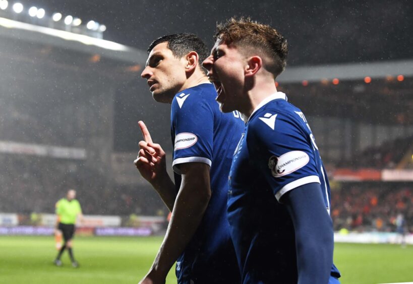 Fin Robertson celebrates Graham Dorrans equaliser for Dundee at Dundee United