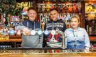 Paul McQueen, general manager at the Old Bank Bar, with assistant manager Ewan Hamilton and team leader Carrie Jefferey. Image: Greene King