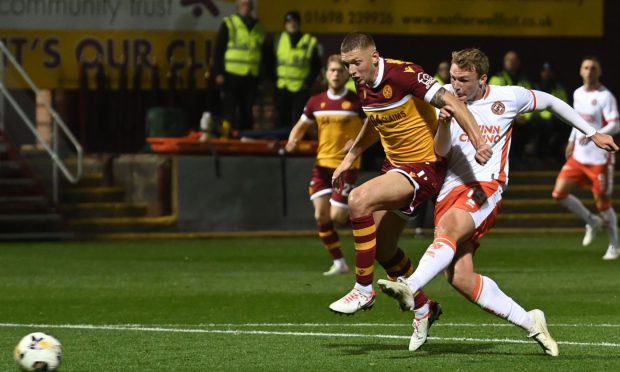 Sam Dalby in action for Dundee United against Motherwell at Fir Park.