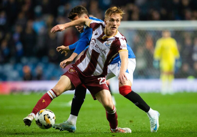 Matt Smith in action against Rangers. 