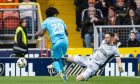 Jack Walton fouls Toyosi Olusanya