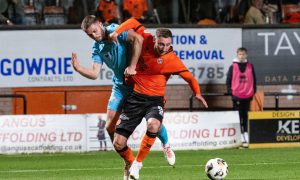 Marcus Fraser has a chunk of Louis Moult's jersey as the pair tussle