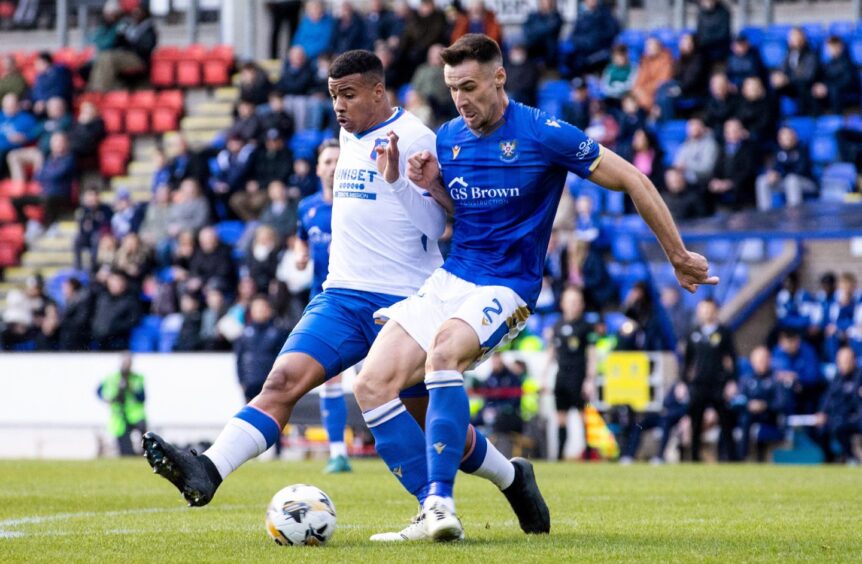 Bozo Mikulic makes a tackle against Rangers. 