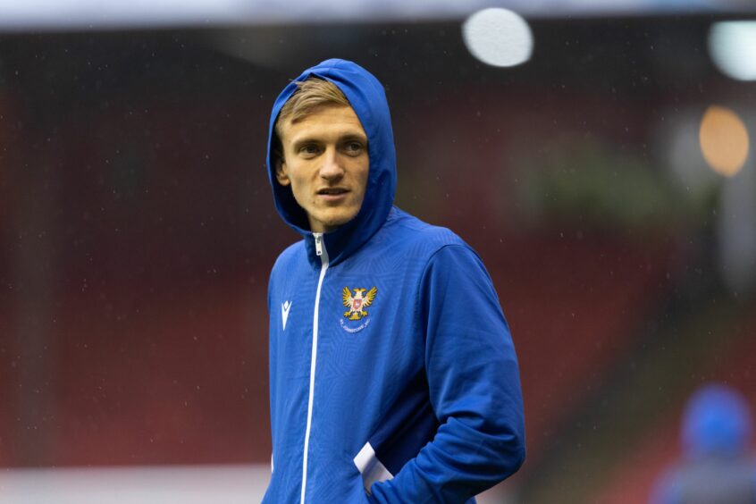 Matt Smith with his hood up before a game in Aberdeen.
