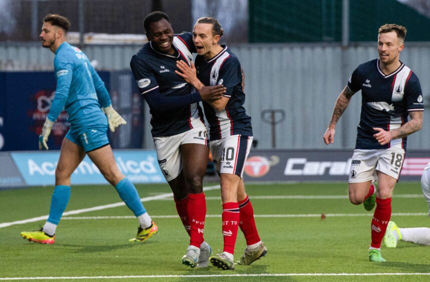 Alfie Agyeman celebrates his opening goal.