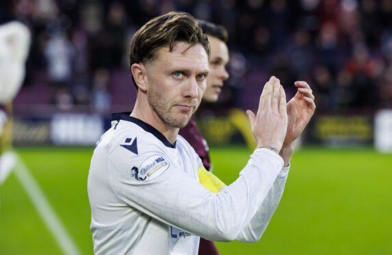 Jordan McGhee skippered Dundee at his former club Hearts. Image: Mark Scates/SNS