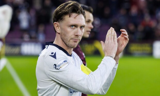 Jordan McGhee skippered Dundee at his former club Hearts. Image: Mark Scates/SNS