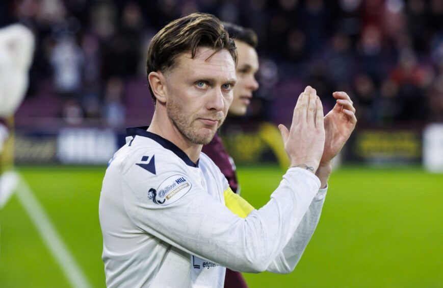 Jordan McGhee skippered Dundee at his former club Hearts. Image: Mark Scates/SNS