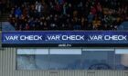 The Fir Park LED screen shows 'VAR check' during United's clash with Motherwell. Image: Craig Foy/SNS