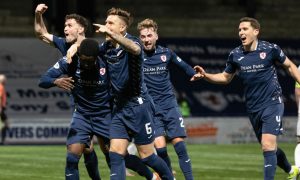 Raith Rovers celebrate Cody David's crucial second goal against Dunfermline Athletic.