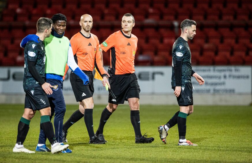 Referee Euan Anderson leaves the pitch after St Johnstone's game against St Mirren.