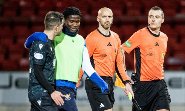 Referee Euan Anderson leaves the pitch after St Johnstone's game against St Mirren.