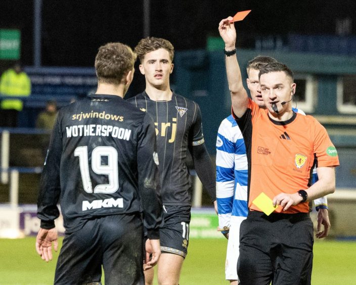 Dunfermline Athletic FC player David Wotherspoon is shown the red card.