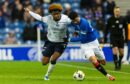 Julien Vetro takes on Rangers for Dundee