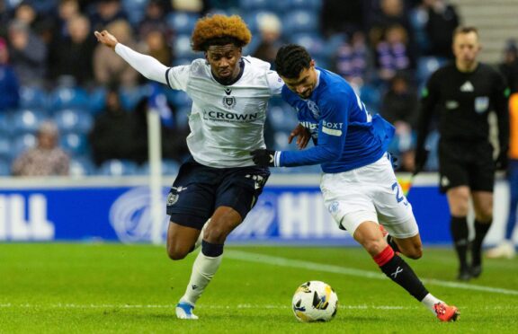 Julien Vetro takes on Rangers for Dundee