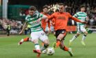 Dundee United's Vicko Sevelj and Celtic's Anthony Ralston tussle during the meeting of their sides at Tannadice in December. Image: SNS