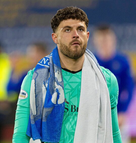 A dejected St Johnstone goalkeeper Josh Rae after the Perth side lost to Hearts.