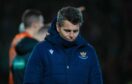 St Johnstone head coach Simo Valakari looks dejected after his team lost to Dundee United.