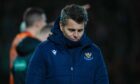 St Johnstone head coach Simo Valakari looks dejected after his team lost to Dundee United.