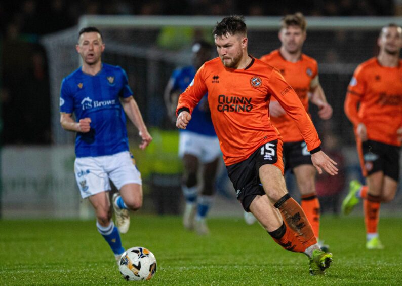 Glenn Middleton runs at the St Johnstone defence.