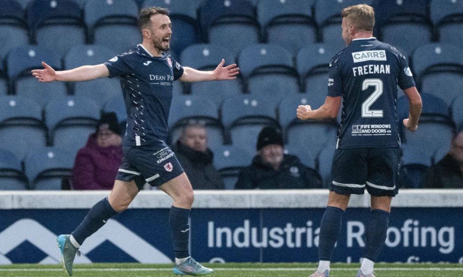 Aidan Connolly celebrates with Kieran Freeman after doubling Raith Rovers' lead against Livingston.