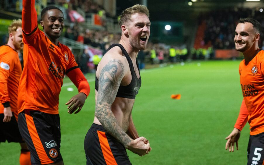 Kevin Holt celebrates Dundee United's dramatic winner.