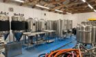 A blue brewery floor has now been fitted inside the Dunblane unit, and brewing equipment has arrived. Image: Sheep in Wolf's Clothing Brewery