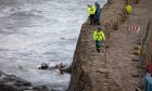 Coastguard teams were called after a fishing boat ran aground and sank in St Andrews. Image: Kenny Smith/DC Thomson