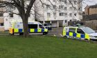 Police outside Ancrum Court. Image: James Simpson/DC Thomson