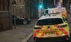 Police cars at Candle Lane in Dundee