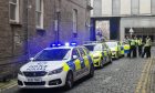 Police at the scene on Candle Lane in Dundee City Centre