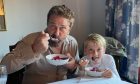 Crieff youngster Leatham Bilsland with Gerard Butler