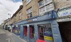 The building above the William Hill shop in Cupar has been identified as posing a risk to the public. Image: Google Maps.
