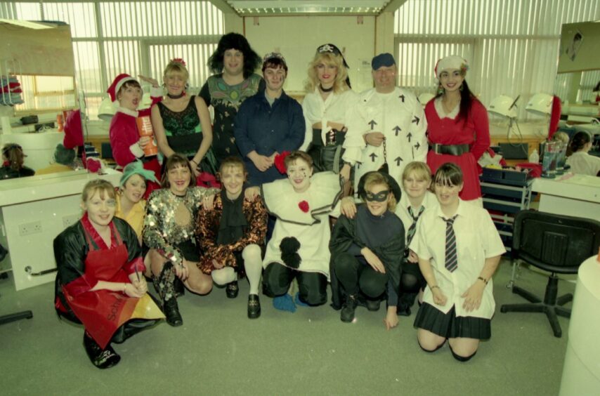 Dundee College staff and students in fancy dress in December 1994. 