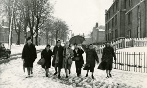 A group of women walk down a snowbound street as they go shopping during the Big Freeze in 1963.