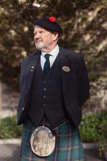 Former Old Course Hotel doorman Gordon Dryburgh at work in his kilt