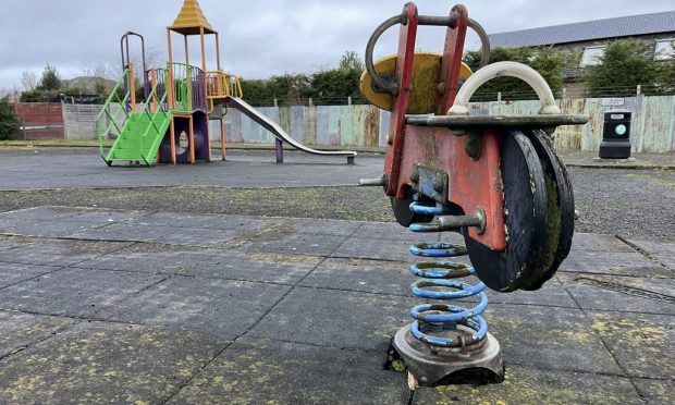 Dilapidated play equipment in the small park at Knowehead in Kirriemuir. Image: Graham Brown/DC Thomson