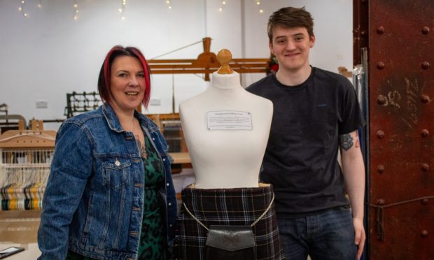 Peter Dickie (right) wove the kilt and local kiltmaker Claire Fell put it together. Image: Isla Glen/DC Thomson